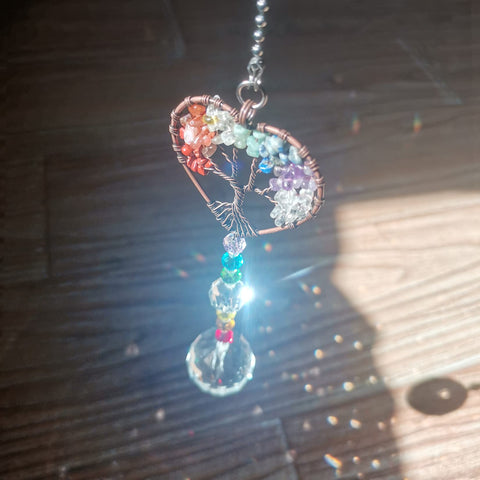 Persofine indoor outdoor rainbow suncatcher adds charm to home or garden.