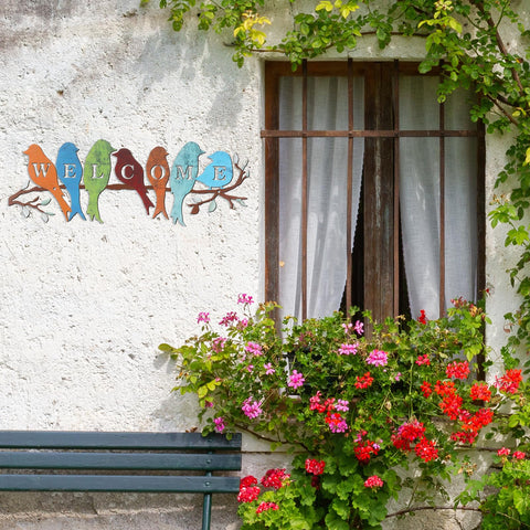 Peryiter porch garden decor invites guests with cheerful birds.