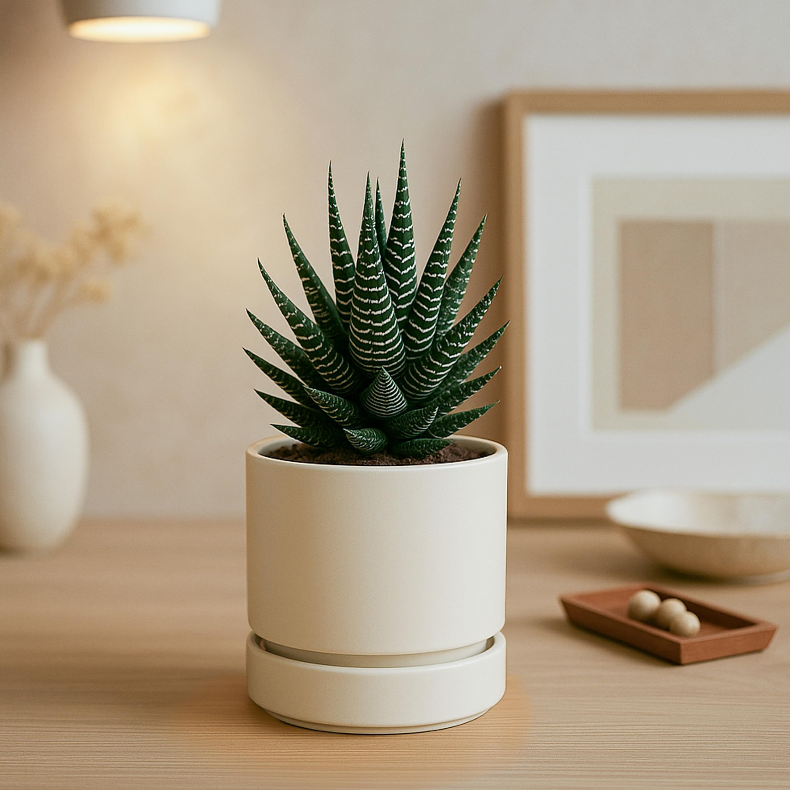 Phoenix Vine oatmeal planter with warm matte finish for neutral decor.