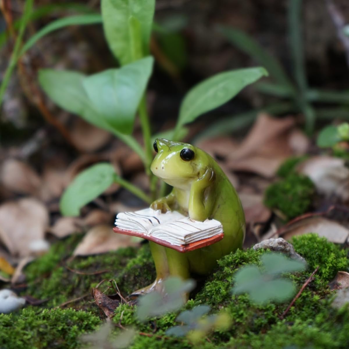 Picocosmxiruo frog and rabbit figurines for glass vases add whimsical charm to outdoor spaces.