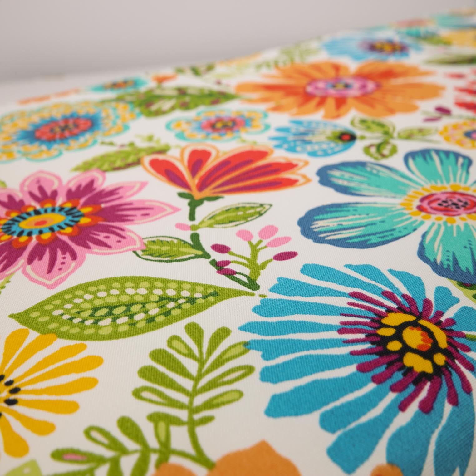 Pillow Perfect Gregoire fabric detail highlights water-resistant outdoor fabric.