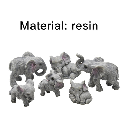 Pinenjoy elephant figurine in playful pose adds whimsy to home or cake toppers.