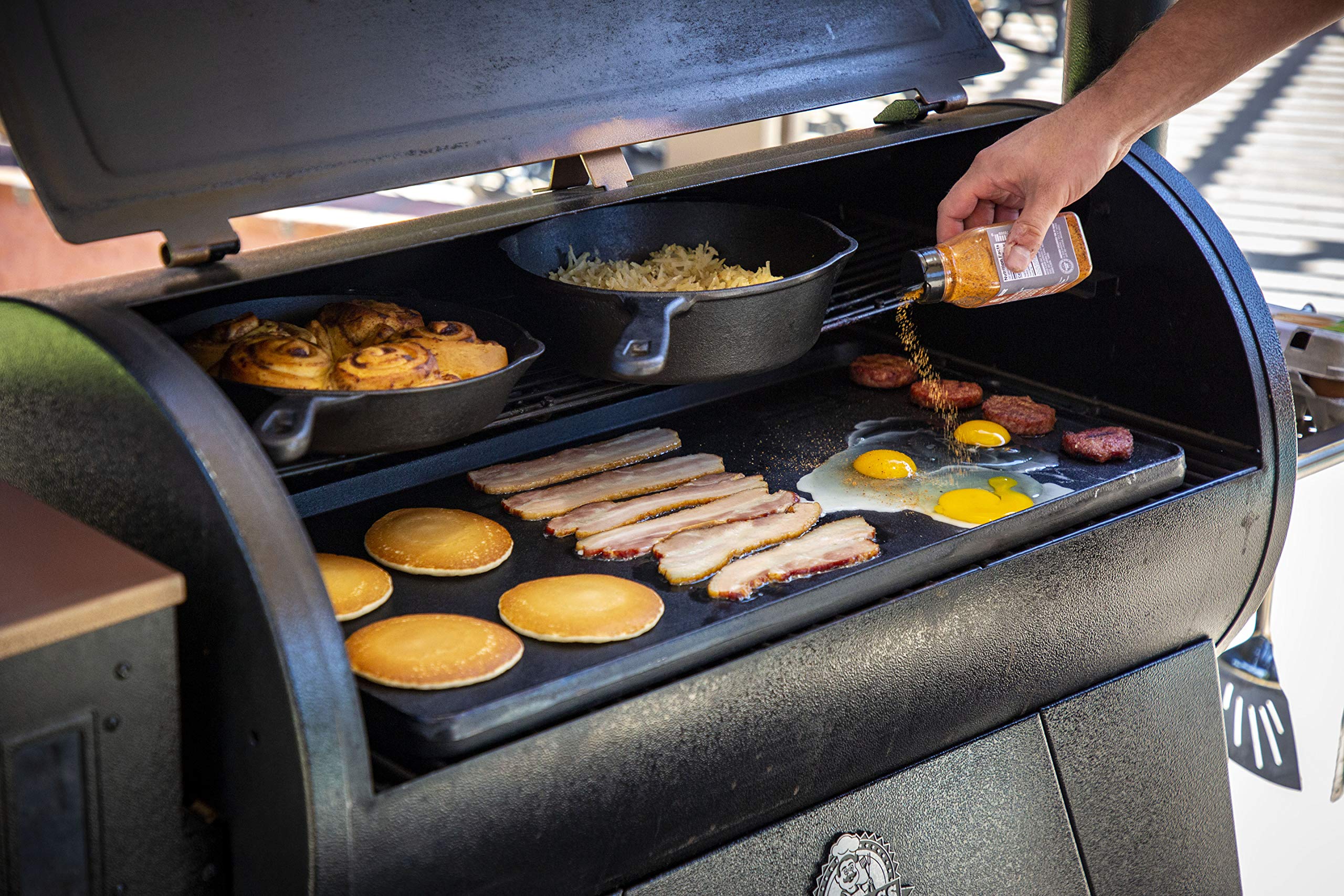 Pit Boss griddle grease trough in action for easy drippings