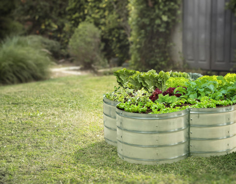 Plant & Plot garden bed in patio scene demonstrates versatile placement in small spaces