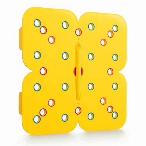 Plant & Plot seedling spacer tool guiding precise seed placement in a tidy grid