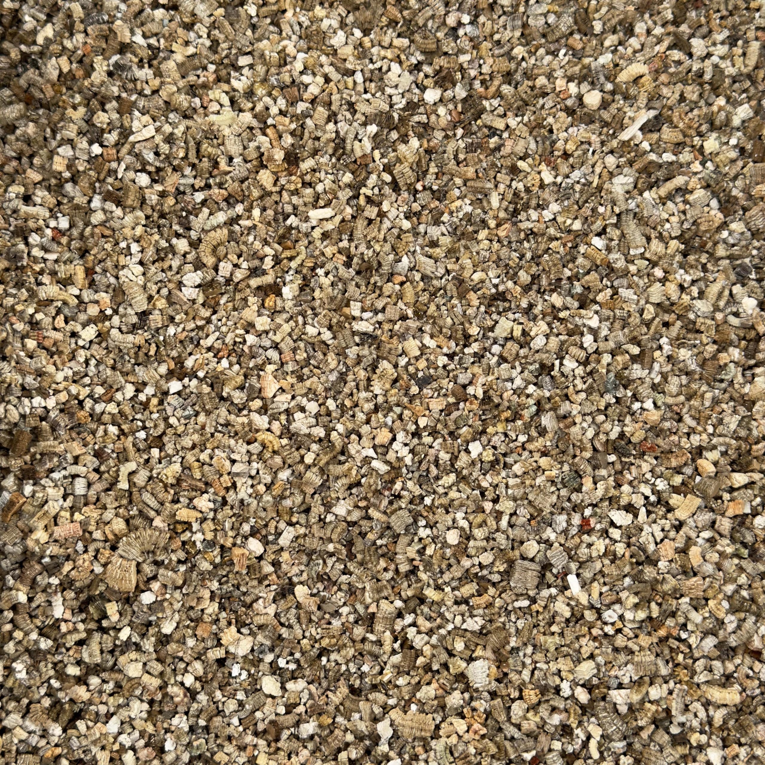 Plantonix Vermiculite Bliss in a garden bed improving soil structure outdoors.