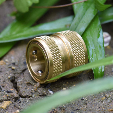 PLG garden hose attachment outdoors showing fast connection to accessories.