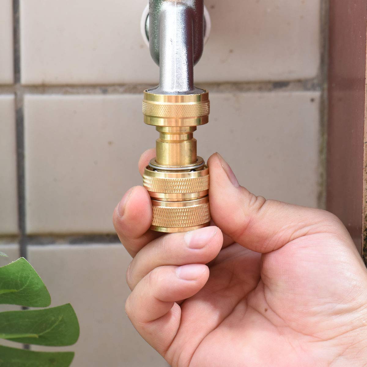 PLG brass quick-connect assembly closeup highlighting durable fittings for outdoor use.