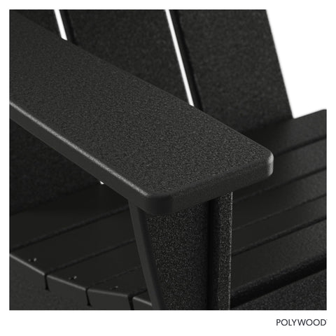 Polywood Modern Adirondack Chair in black placed on a patio setup.