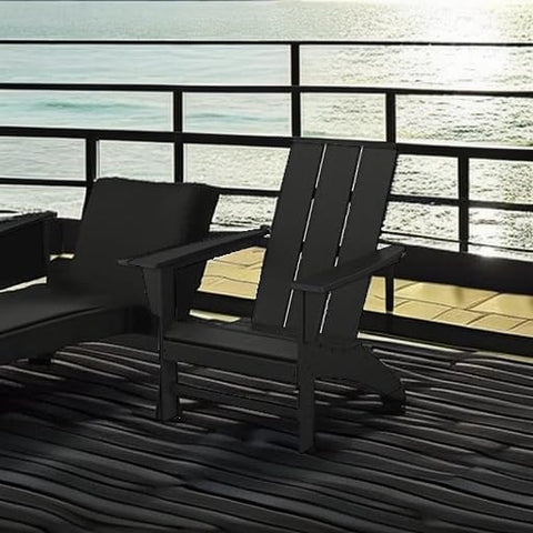 Front view of Polywood Adirondack chair in black with waterfall edge for leg comfort.