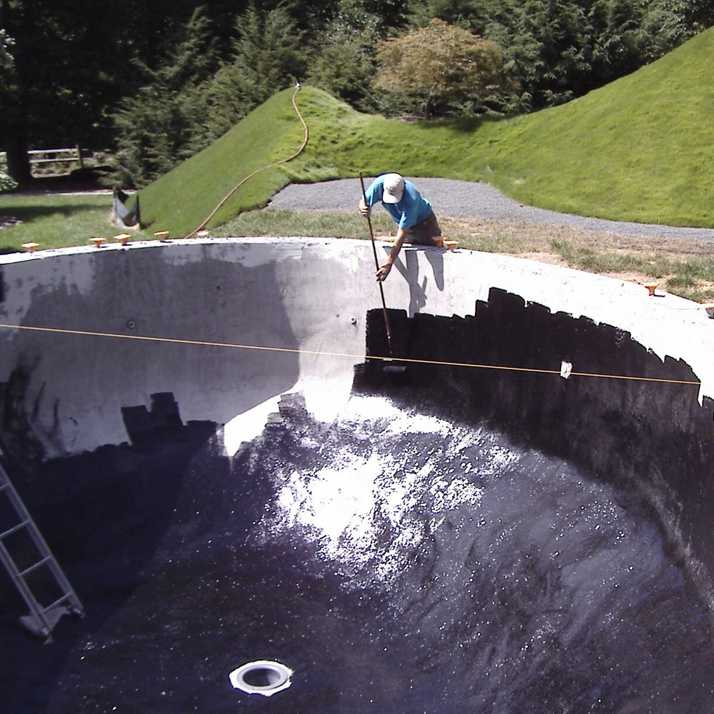 Pond Shield epoxy paint under water application showing durable seal for koi ponds.