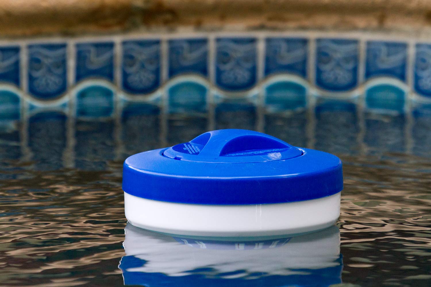 Poolmaster 32155 chlorine tablet holder allows easy loading