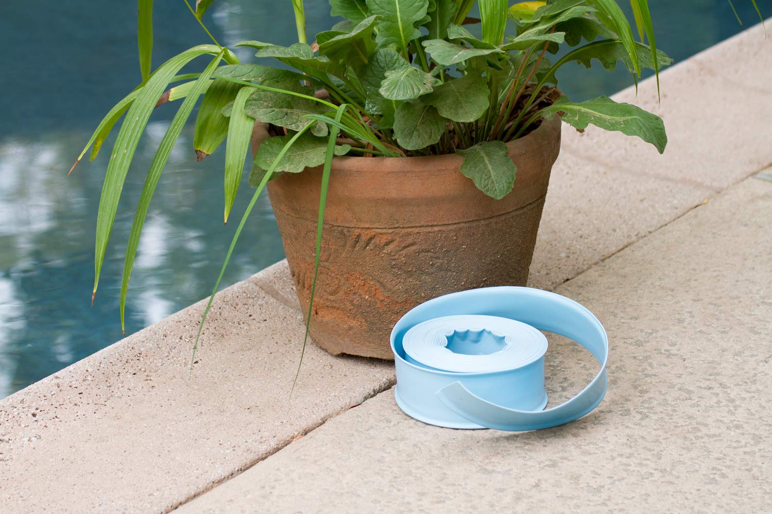 Poolmaster all-weather backwash hose in durable vinyl for outdoor use.