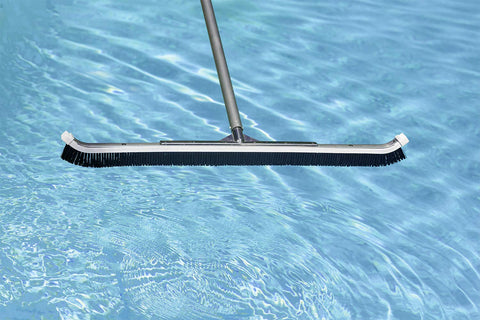 Curved head with nylon bristles increases contact with pool surfaces