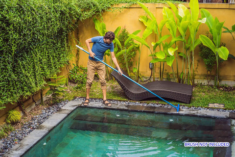 POOLWHALE pole in use with skimmer net demonstrates extended reach