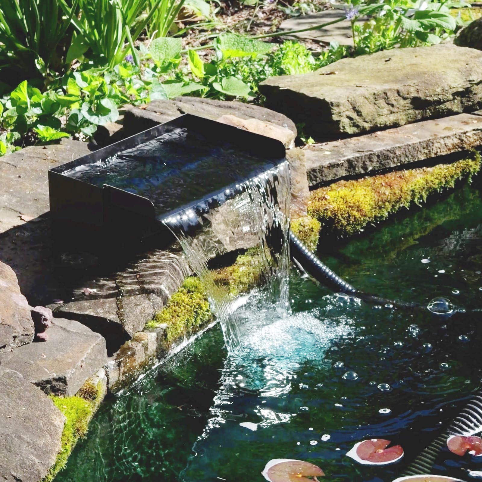 POPOSOAP pond pump 40W 660GPH delivers steady gentle flow for a dramatic cascade.