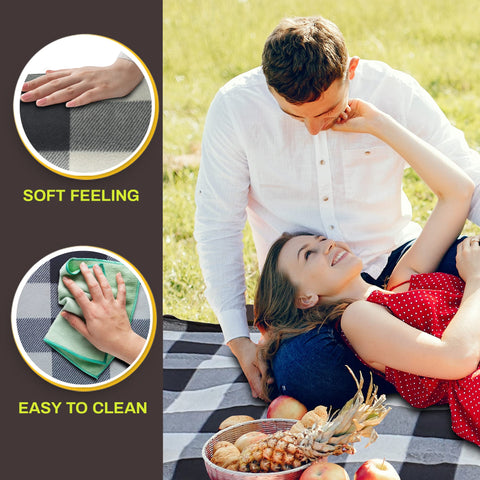 PortableAnd Picnic Blanket waterproof back keeps damp ground at bay.