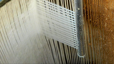 Power Pic Reach attached to a garden hose shows efficient cleaning with reduced splash back.