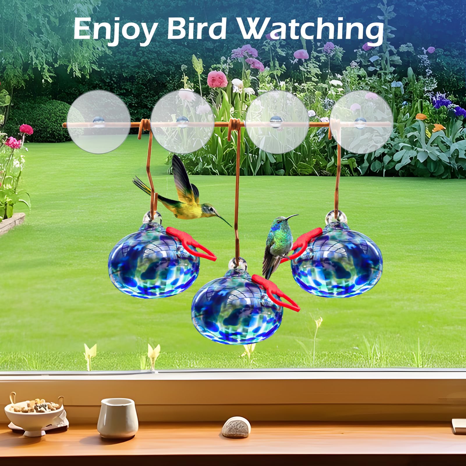 Pozfun hand-blown glass hummingbird ball offers close-up viewing from indoors.