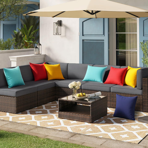 Premillow outdoor pillow cover yellow folded for easy storage.