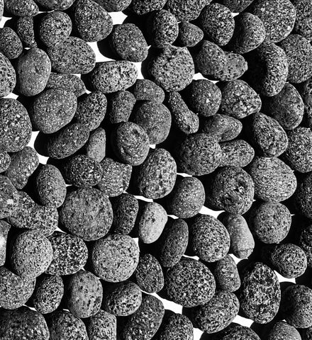 Premium Pebbles lava rocks for fire pits with 1-2 inch pieces provide heat retention and style.