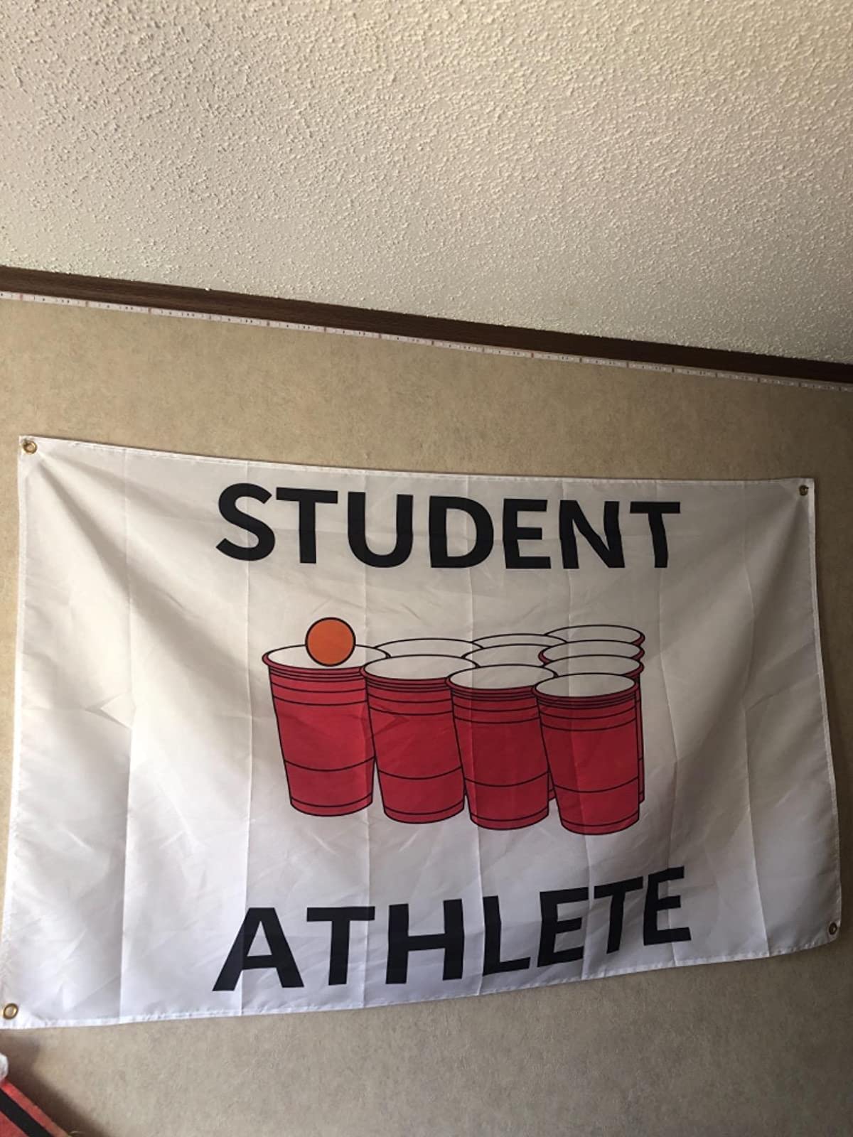 Probsin flag with brass grommets ensures secure hanging during events.