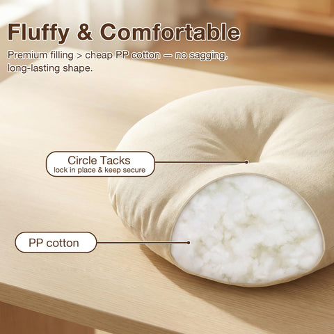 Close-up of PRONOUS tufting detail on beige round cushion.