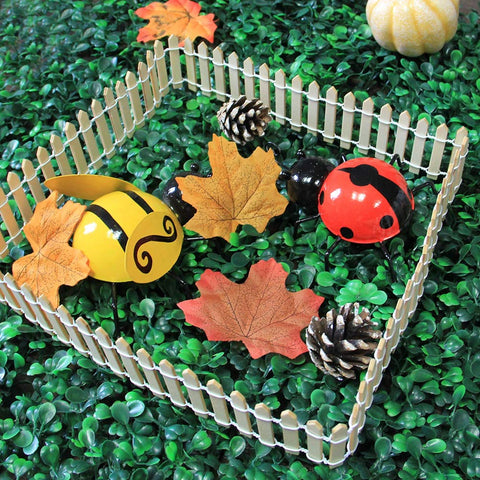 Prsildan decorative fence ornament enhances planters and terrariums with rustic flair.