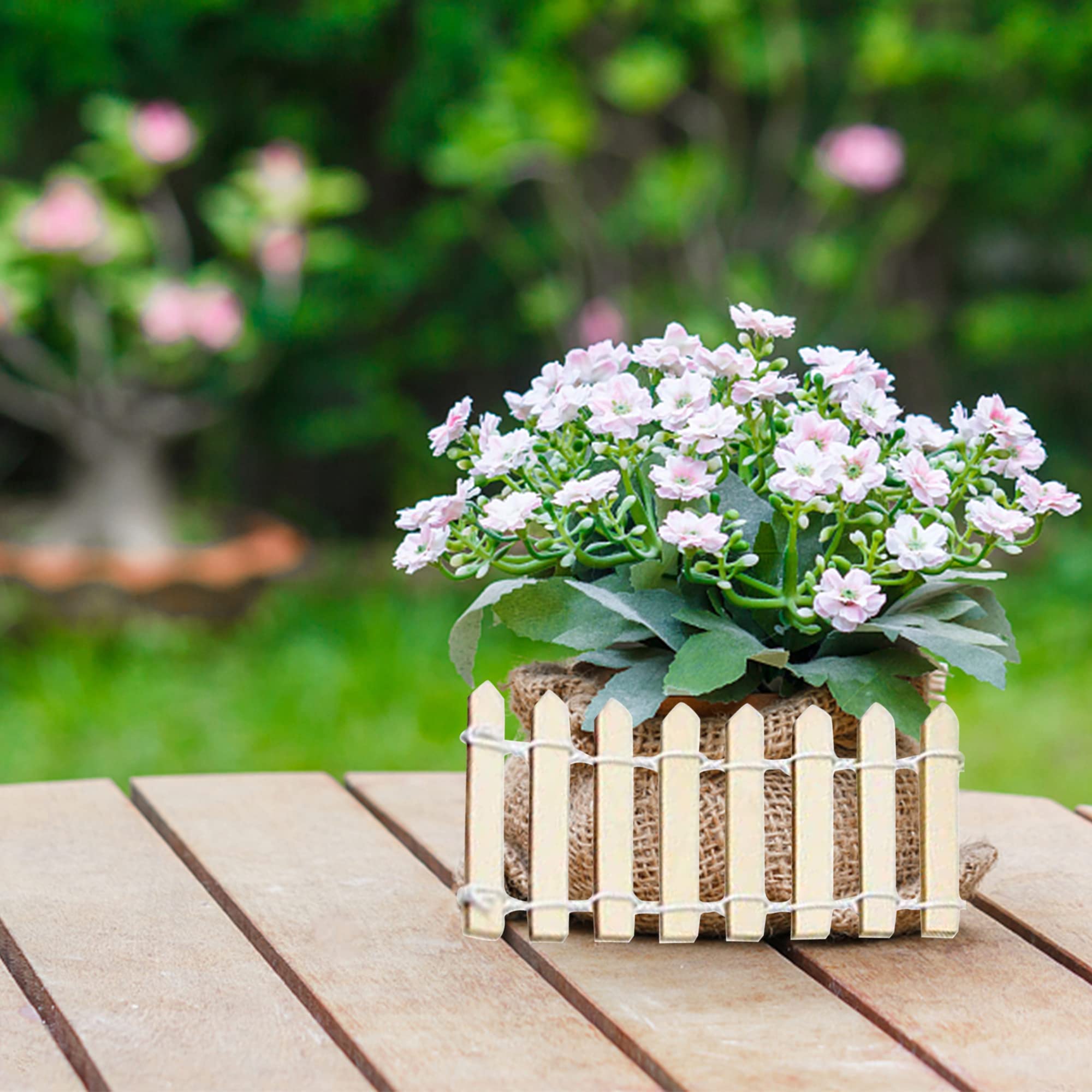 Prsildan picket fence ornament in natural wood for charming garden setups.