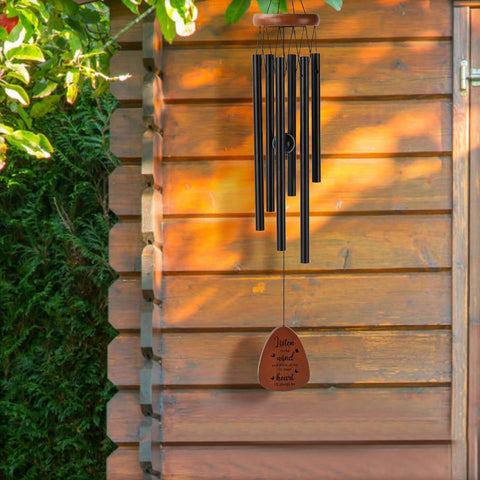 PRSTENLY wind chimes close-up engraving highlights personal touch and enduring remembrance.