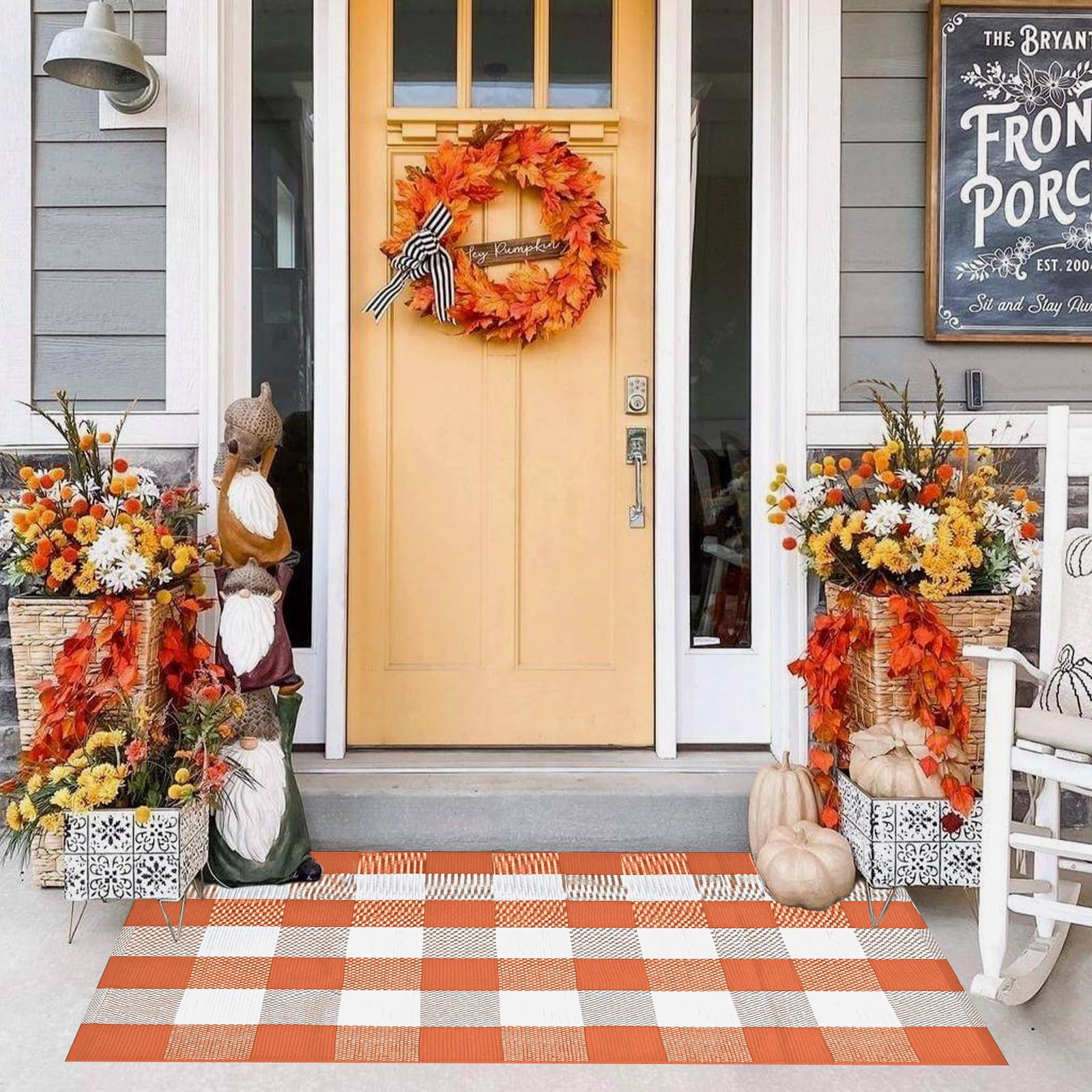 Pseutio Buffalo Plaid Rug on patio showcases rugged outdoor-ready fabric.
