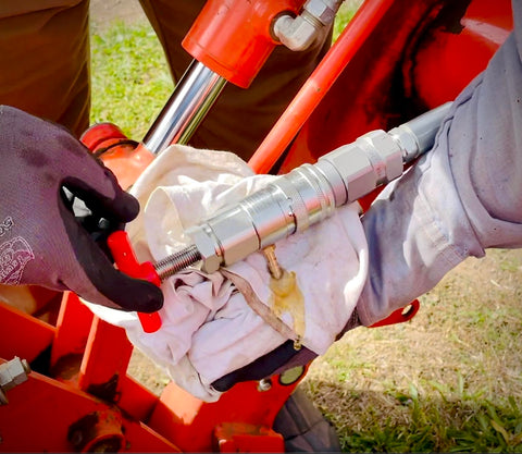 PT Squared Trading Co. compact relief tool stored in a tractor toolbox for easy access.
