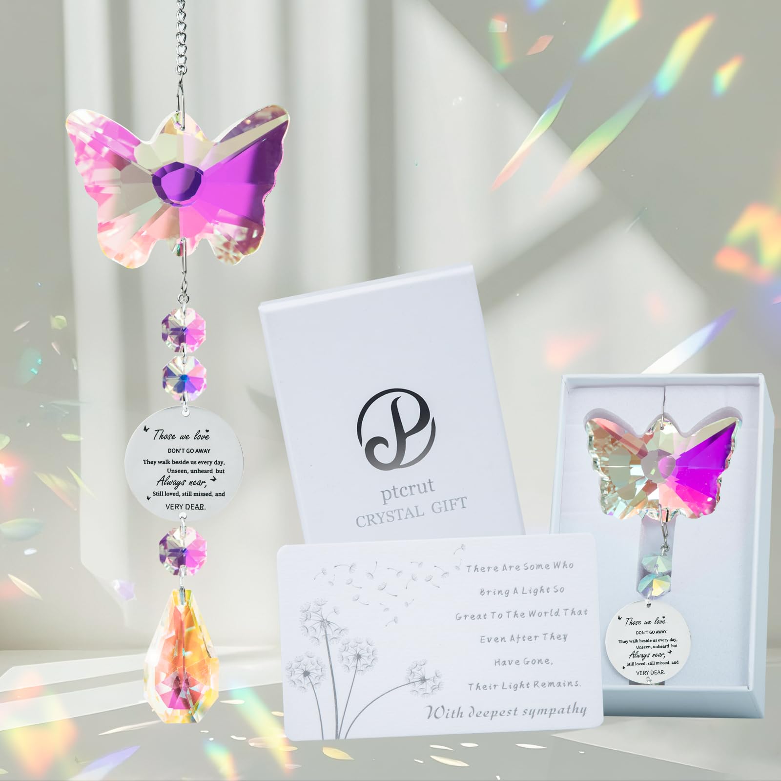 ptcrut memorial suncatcher butterfly creates a gentle rainbow by the window.