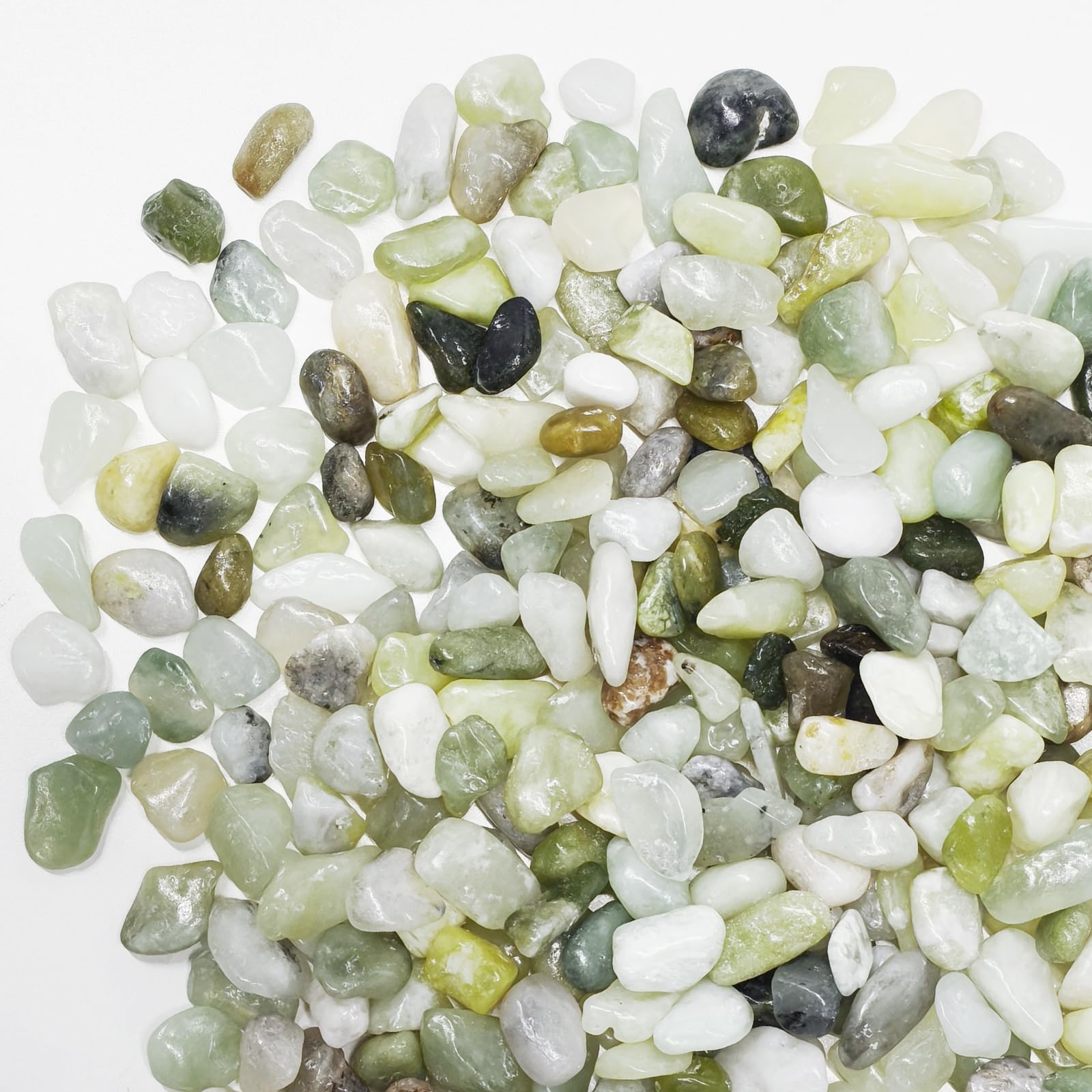 Pulovin jade pebbles close-up showing natural shine for decorative accents.