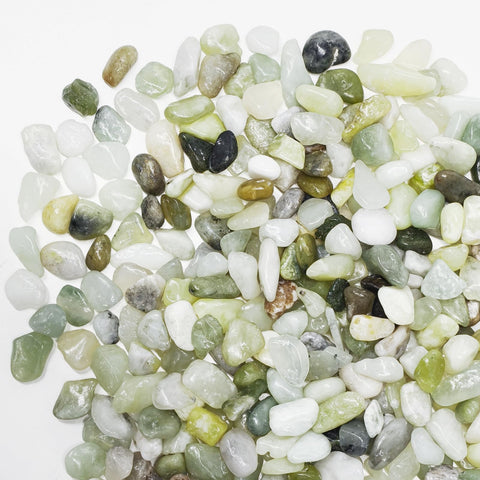 Pulovin jade pebbles close-up showing natural shine for decorative accents.