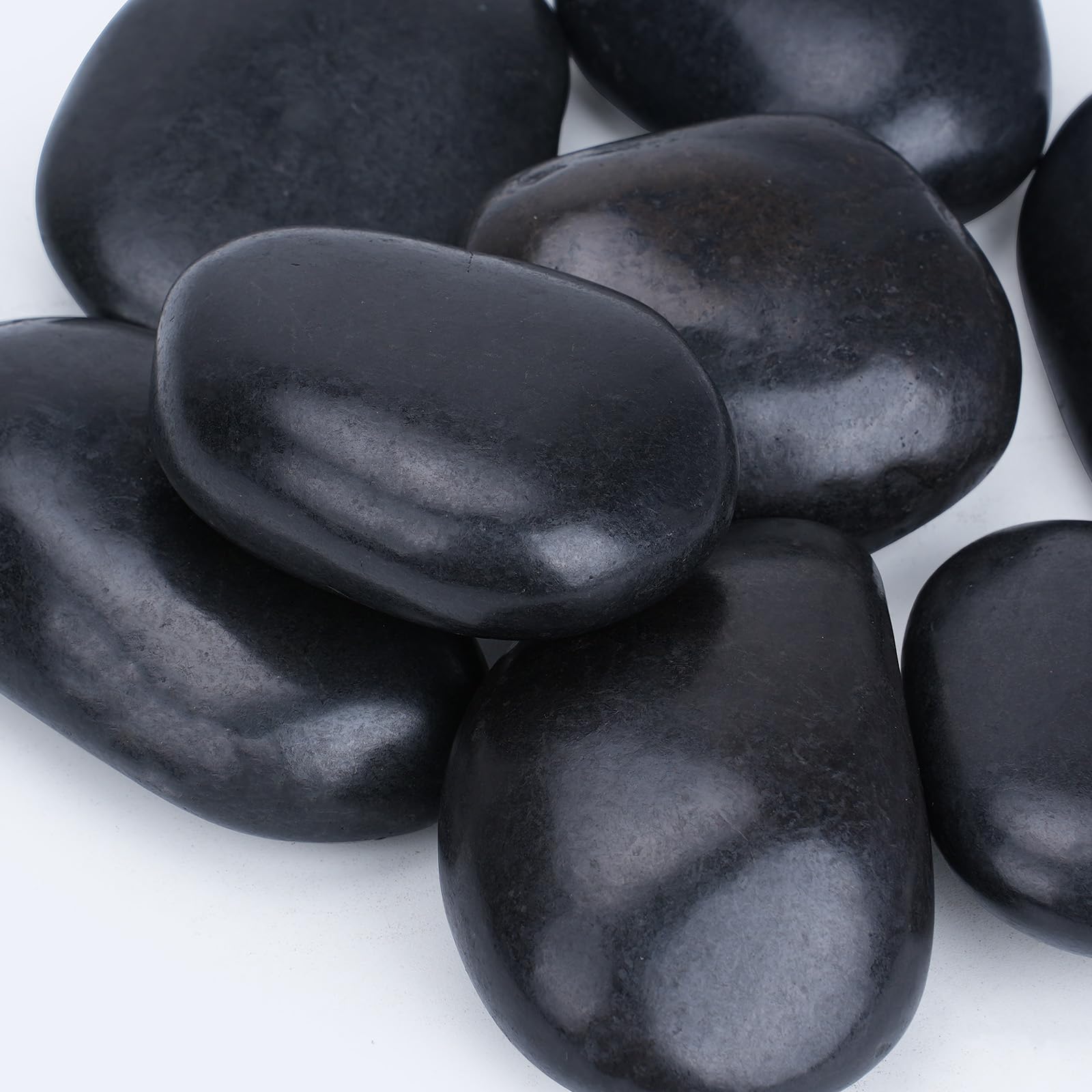 Pulovin black stones, 3–4 inch for pots and indoor plant displays.