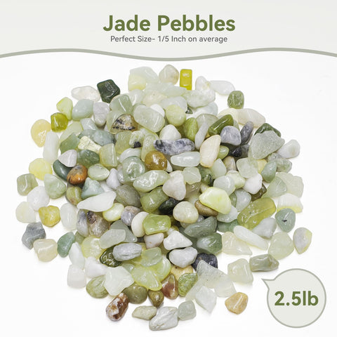 Pulovin jade pebbles in a glass vase for modern centerpiece.
