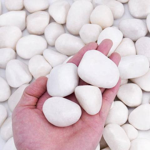 Pulovin white river rocks 1-2 inch bag close-up, ideal for plant containers to aid drainage and decor.