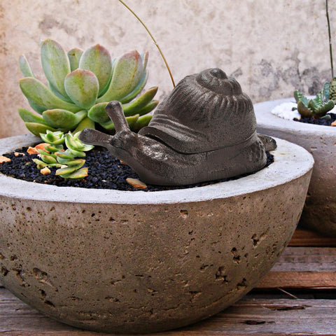 Pumtus snail decoration garden ornament adds charm while concealing a key