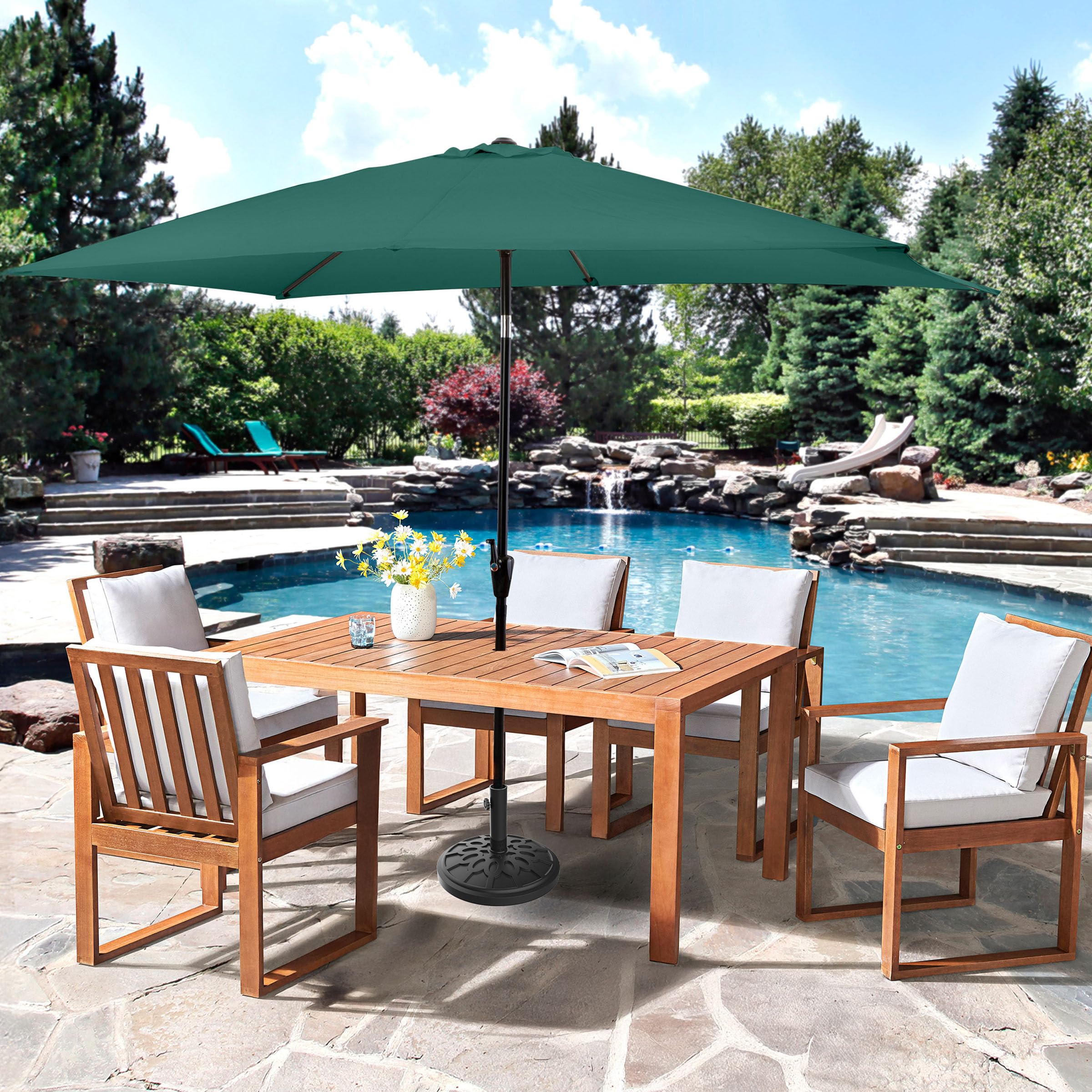 Pure Garden umbrella base in use beside a patio table for shade.
