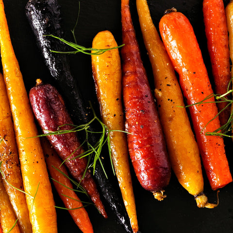 Purely Organic Rainbow Carrot Seeds harvest baby carrots at early stage.
