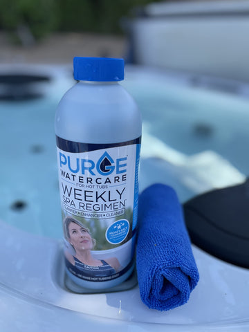 Purge Watercare bottle on spa ledge emphasizes convenient weekly regimen.