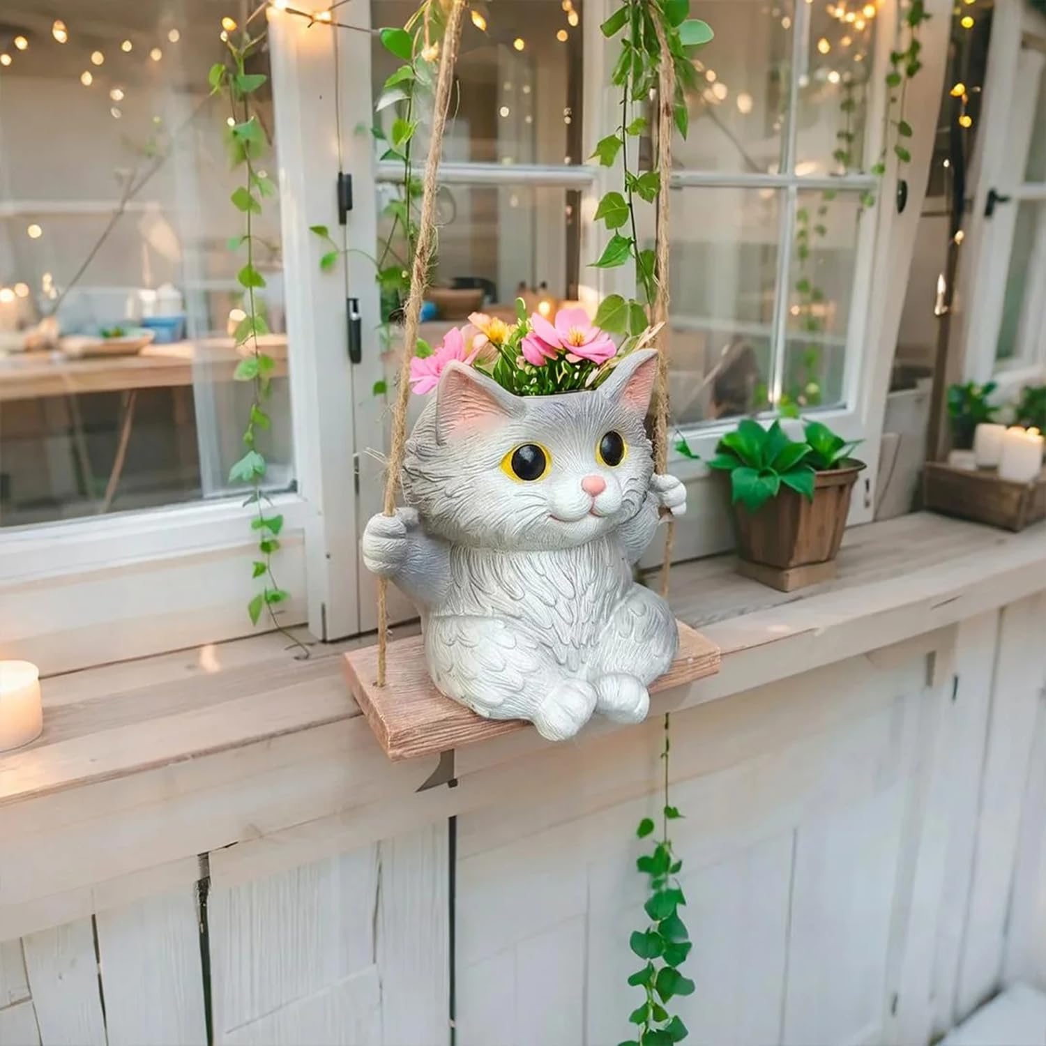 Pyoimmne cat hanging planter perfect for compact spaces and windowsill displays.