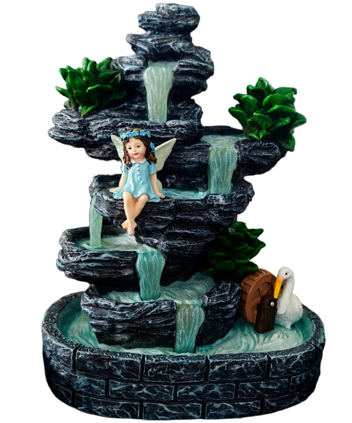 QCF Fairy Garden Waterfall statue glowing in evening outdoor scene