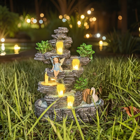 QCF Fairy garden centerpiece creating magical ambiance outdoors