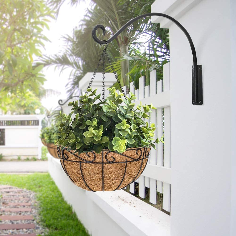 Garden display featuring elevated pots secured by Qiang Ni hanger.
