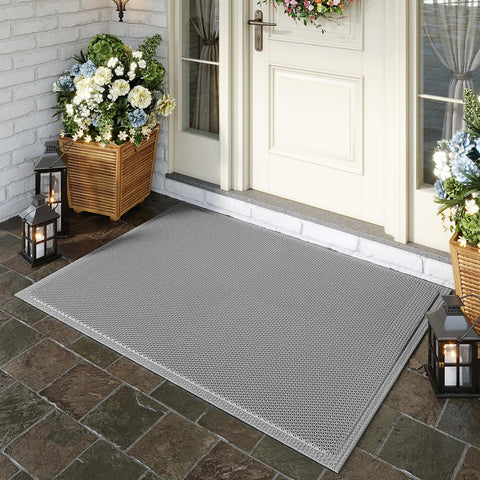 QiCaiJia non-slip texture keeps the mat secure on tile and concrete.