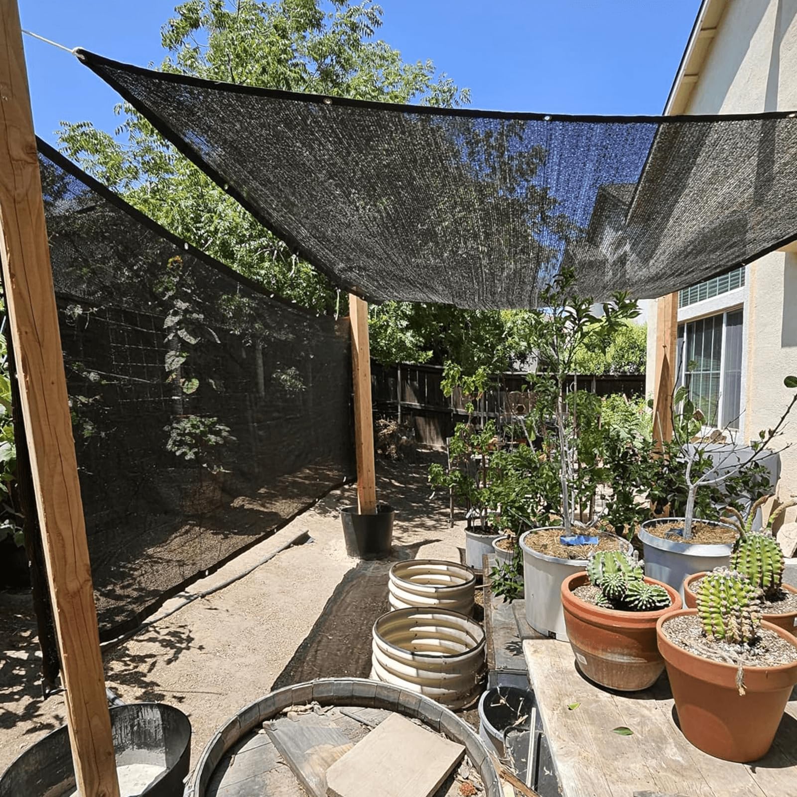 QLOFEI breathable fabric shade cloth keeps air moving around plants