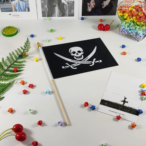 QQSD 12-pack flags ready for pirate party decor.