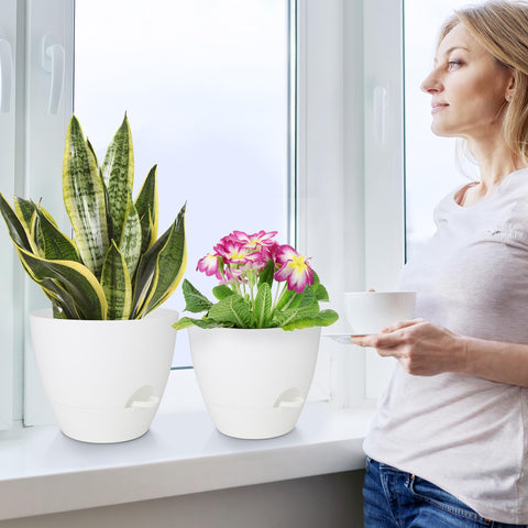 QRRICA set of 5 planters with drainage and saucers supports versatile placement.